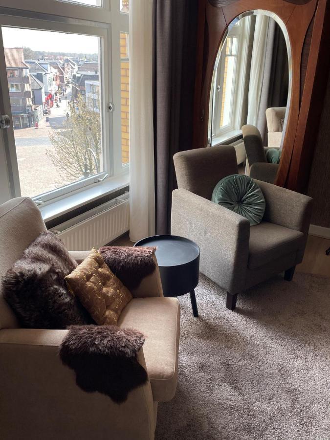 Hotel Restaurant Stad Munster 빈터스빅 외부 사진 A living room with a radiator