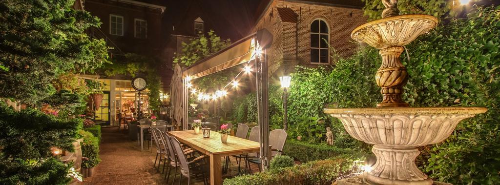 Hotel Restaurant Stad Munster 빈터스빅 외부 사진 The garden at night